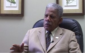 Henry L. Marsh, III speaking during the September 2008 interview. He is seated wearing a suit and tie. 